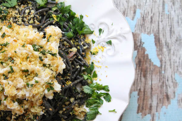 black pasta with crabs and herbs