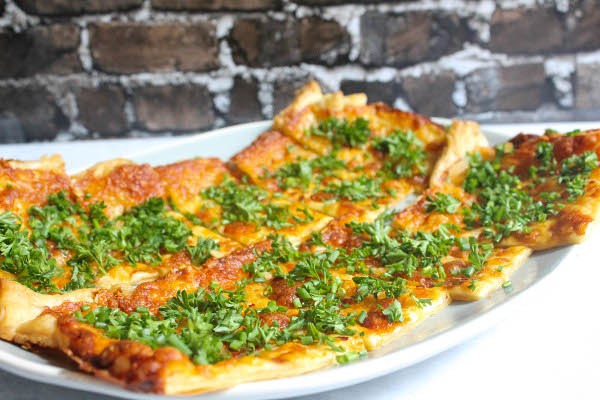 garlic and cheese pizza with herbs